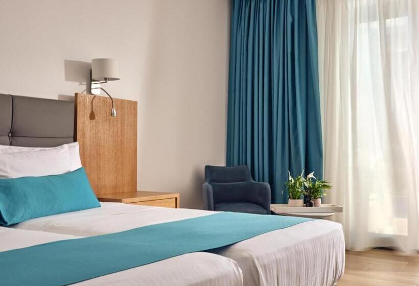 Полулюкс, Cavo Orient Beach Hotel & Suites